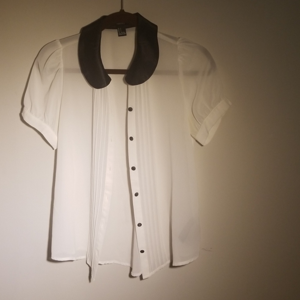 White shirt with black collar